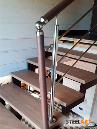 Лестница из металла соединяющая два этажа. Дизайнерская лестница
